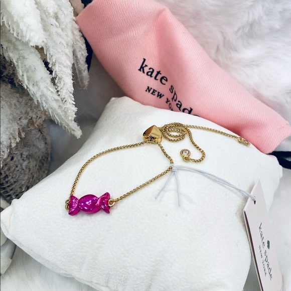Kate Spade Candy bracelet Stunning gold tone with pink candy! Christmas gift